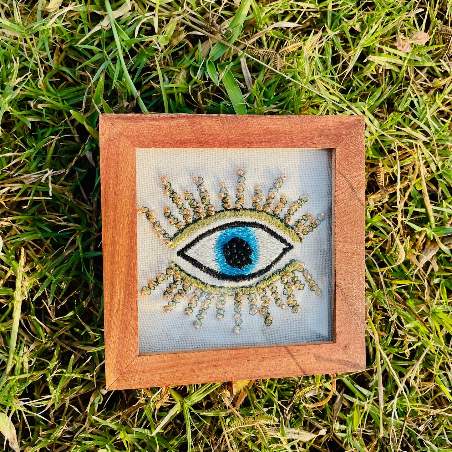 HAND-EMBROIDERED EVIL EYE  COASTER